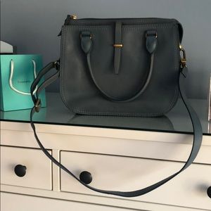 Fossil crossbody satchel in dark robin’s egg blue